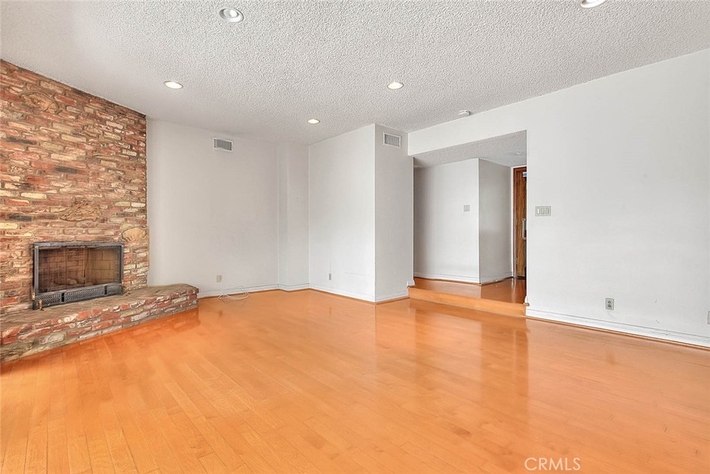 620 North 5th Street Montebello, CA 90640 - Photo 25 of 68 an empty room with a fireplace