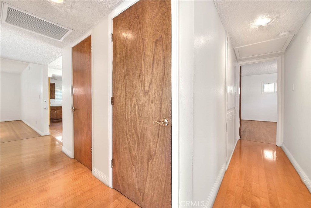 620 North 5th Street Montebello, CA 90640 - Photo 31 of 68 a view of a hallway with a hallway to a bedroom