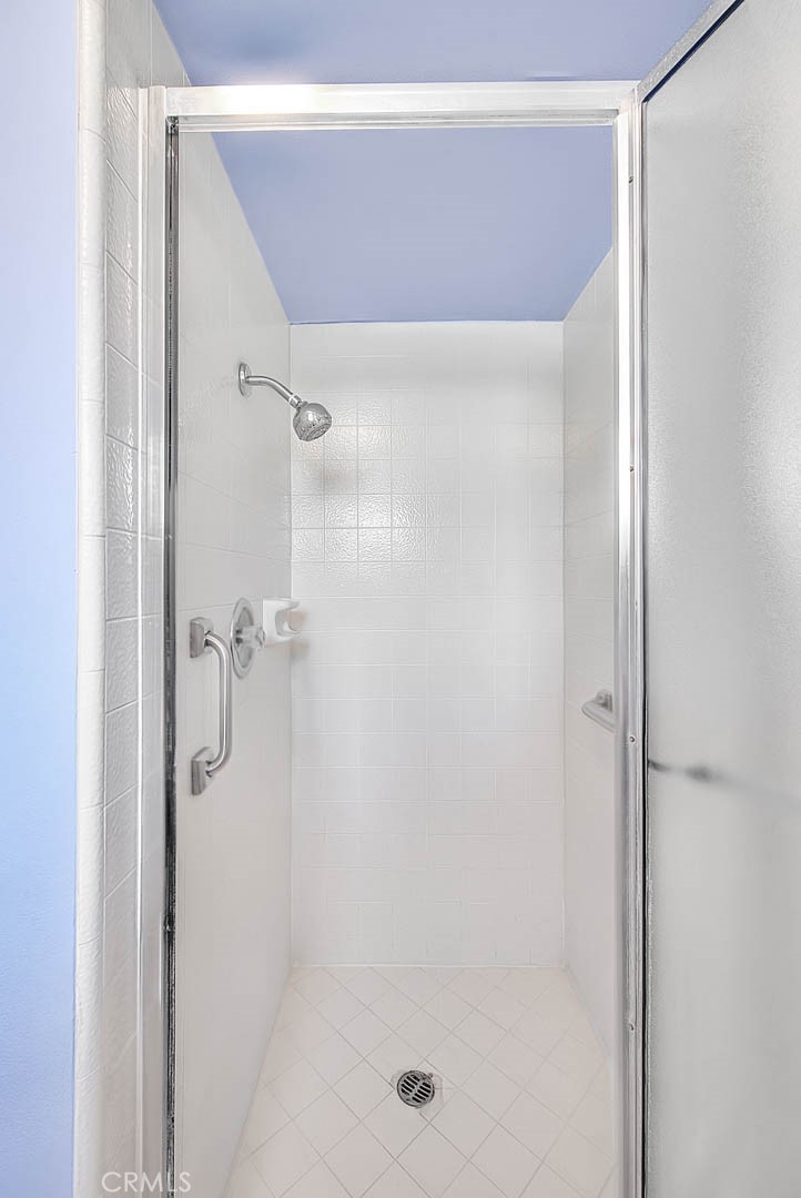 620 North 5th Street Montebello, CA 90640 - Photo 38 of 68 a bathroom with a glass shower door