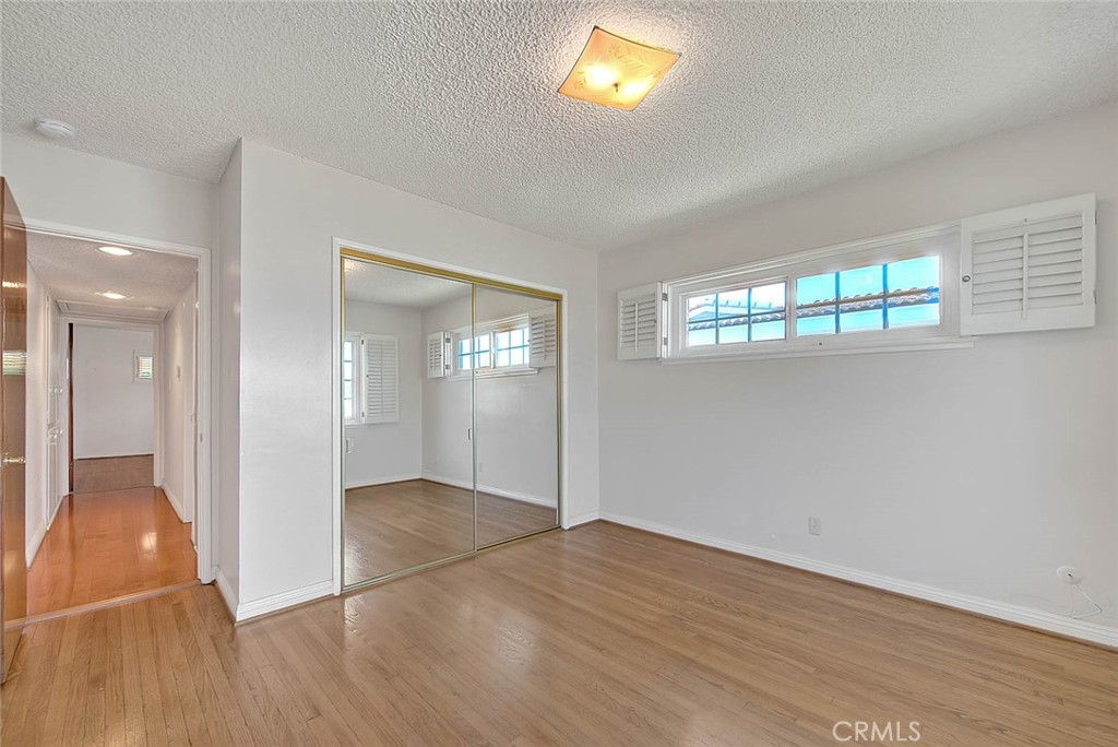 620 North 5th Street Montebello, CA 90640 - Photo 48 of 68 an empty room with wooden floor and windows