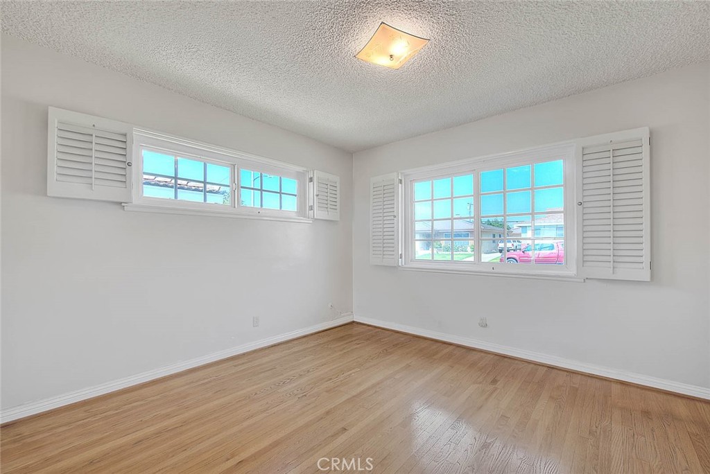 620 North 5th Street Montebello, CA 90640 - Photo 50 of 68 an empty room with wooden floor and windows