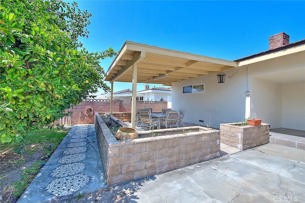 620 North 5th Street Montebello, CA 90640 - Photo 60 of 68 a view of a backyard with table and chairs