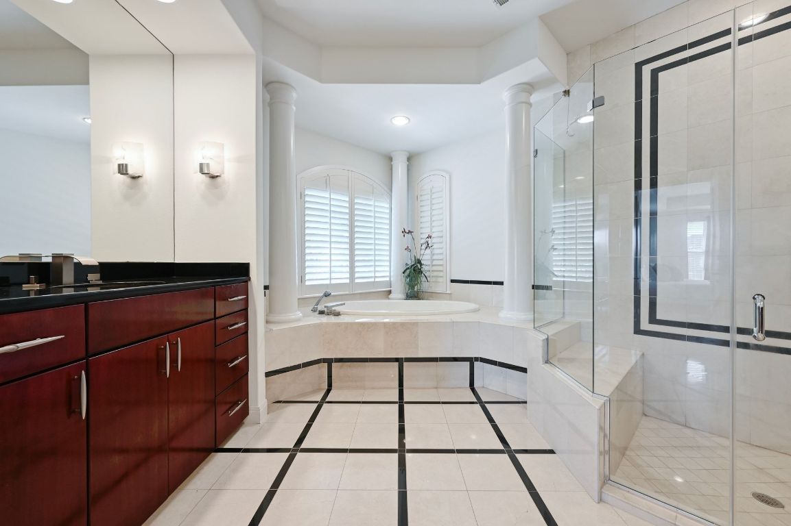 405 Barrett Lane, Unit 1 Austin, TX 78733 - Photo 15 of 26 a spacious bathroom with a tub shower and sink