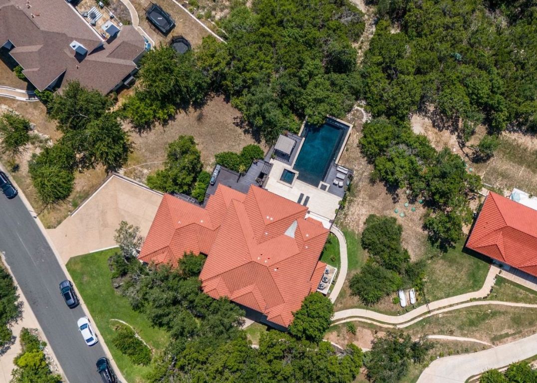 405 Barrett Lane, Unit 1 Austin, TX 78733 - Photo 2 of 26 an aerial view of a house with garden space and street view