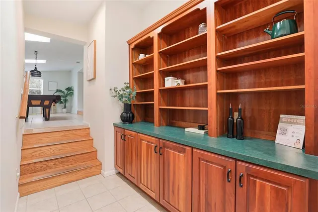a bathroom with a sink and vanity