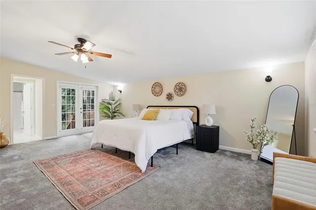 a view of a house with a yard porch and sitting area