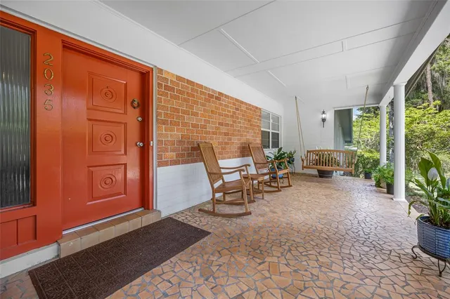 a view of a chairs in front of house
