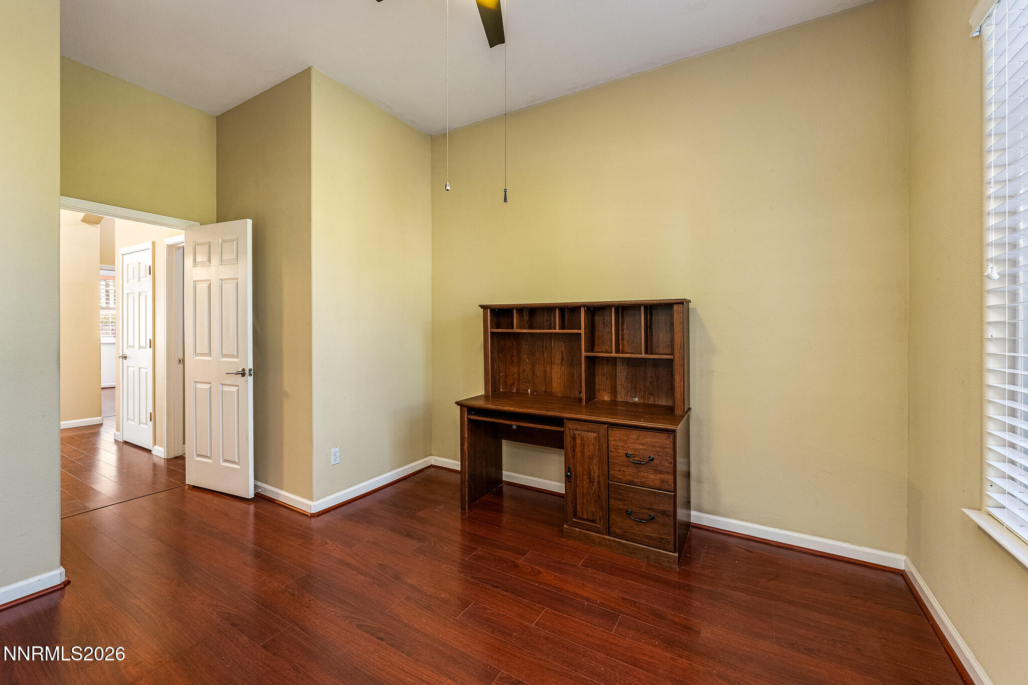 1840 Hunter Creek Road Reno, NV 89519 - Photo 21 of 39 a view of a room with wooden floor