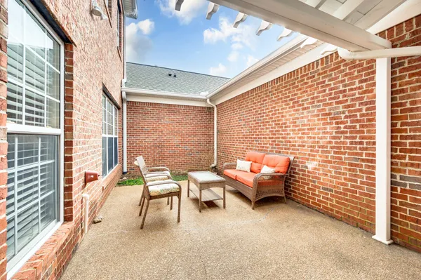 a balcony with furniture