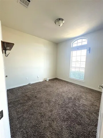 a view of empty room with window