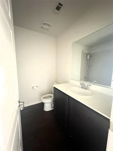 a bathroom with a sink and a toilet
