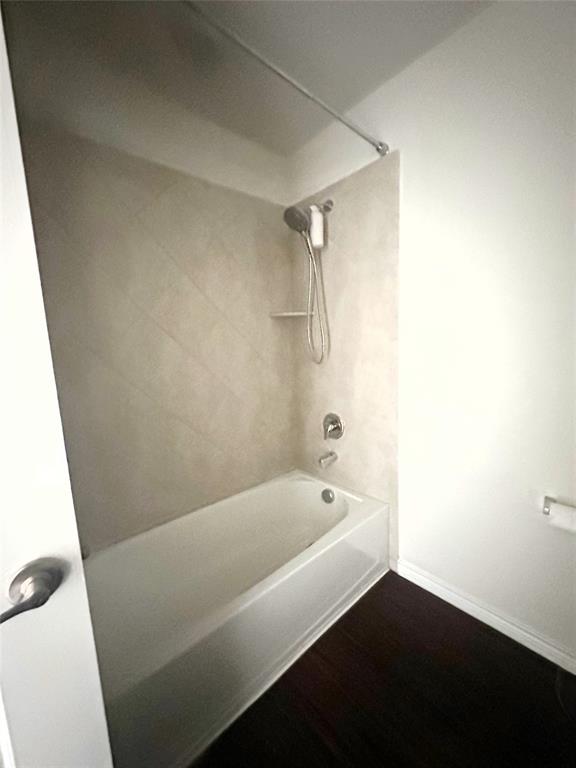 223 Garden Grove Drive Waxahachie, TX 75165 - Photo 20 of 24 a bathroom with a bathtub and a shower