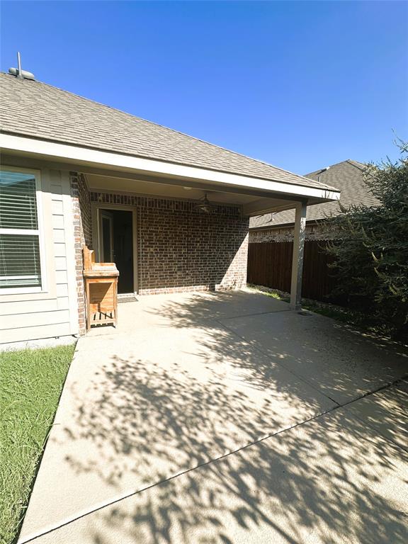 223 Garden Grove Drive Waxahachie, TX 75165 - Photo 24 of 24 a view of a terrace with a outdoor space