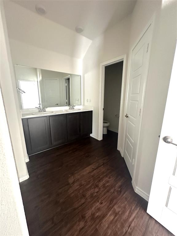 223 Garden Grove Drive Waxahachie, TX 75165 - Photo 9 of 24 a view of kitchen and wooden floor