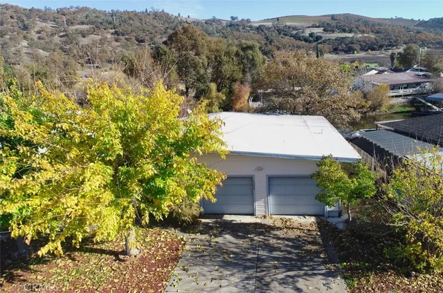 a backyard of a house with lots of green space
