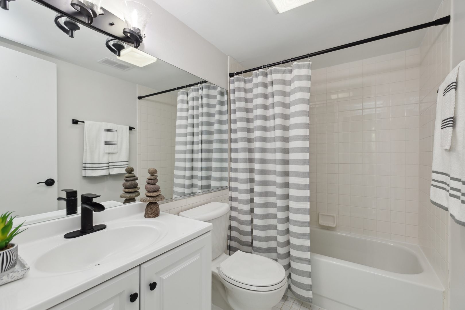 1 Renaissance Place, Unit 417 Palatine, IL 60067 - Photo 16 of 26 a bathroom with a sink toilet and shower