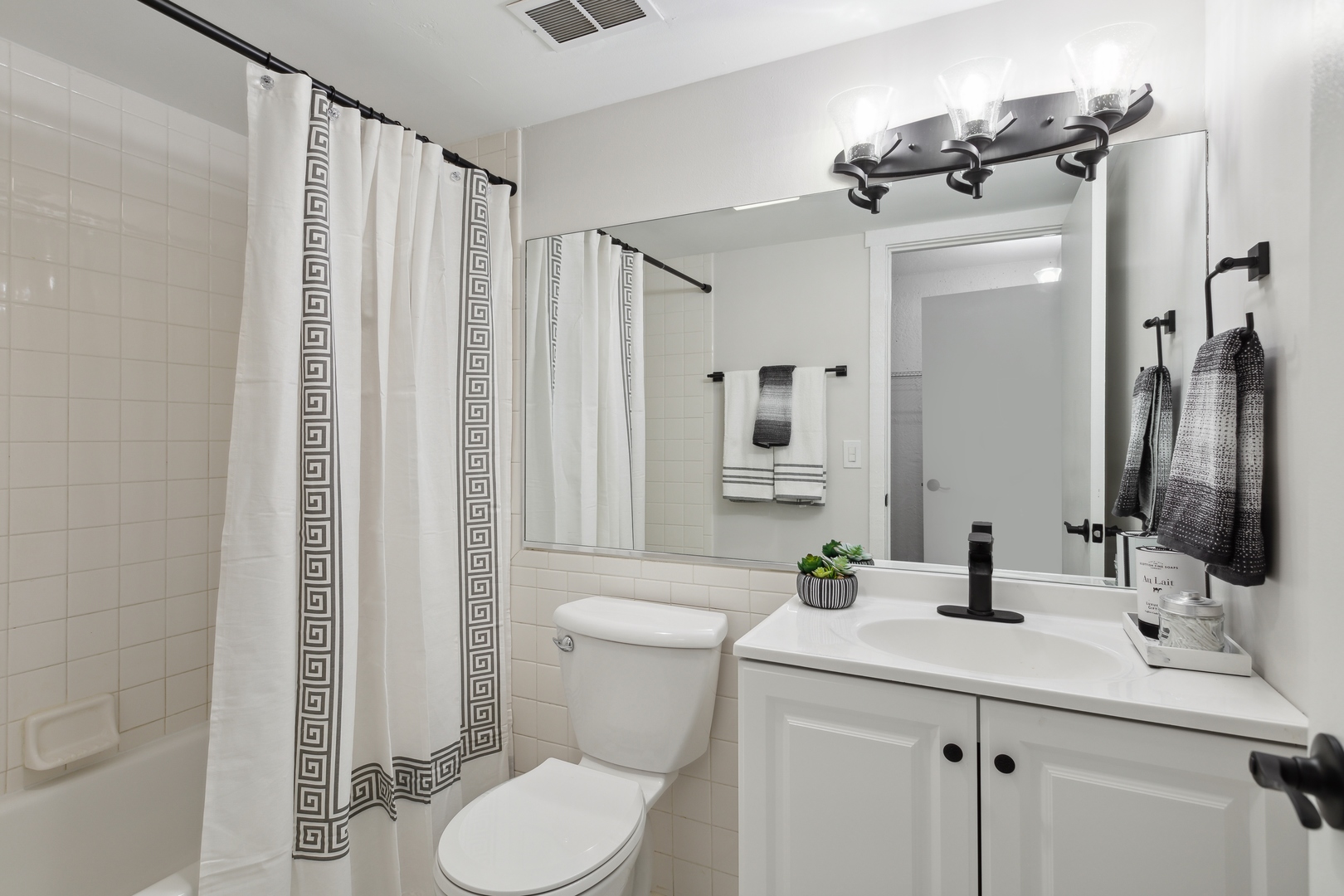 1 Renaissance Place, Unit 417 Palatine, IL 60067 - Photo 22 of 26 a bathroom with a sink toilet and shower