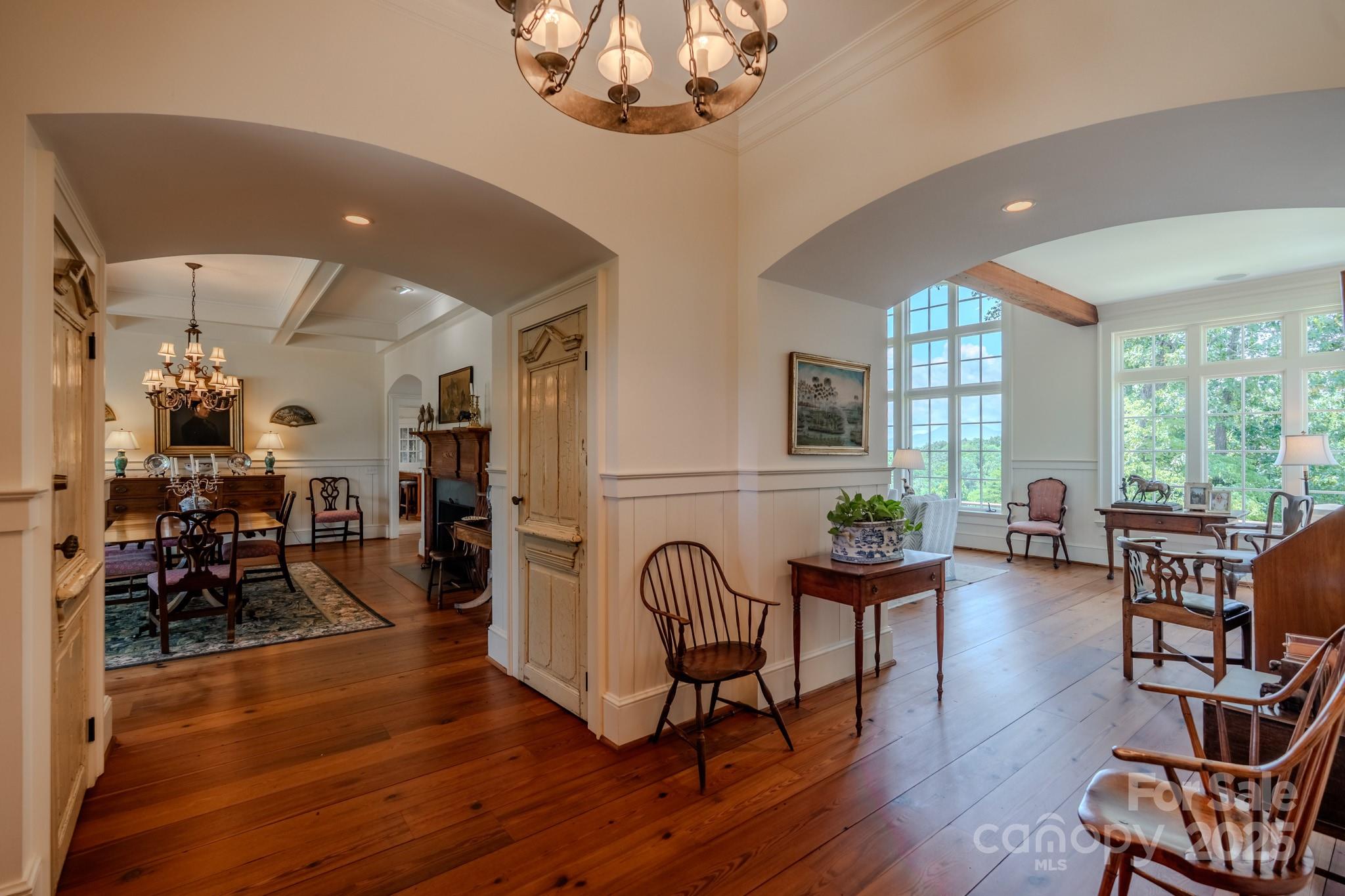 650 Golf Course Road Tryon, NC 28782 - Photo 14 of 48 a living room with furniture and wooden floor