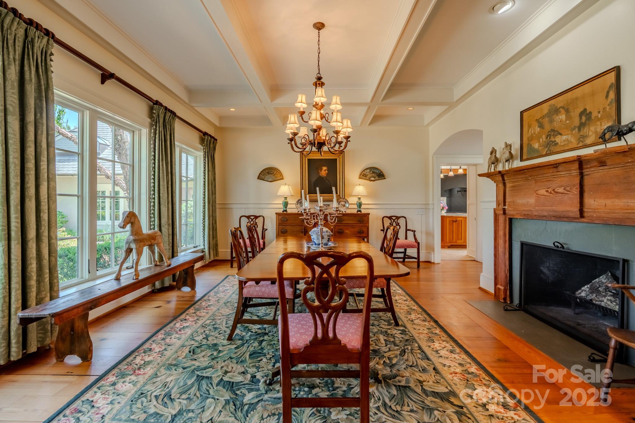 650 Golf Course Road Tryon, NC 28782 - Photo 19 of 48 a view of a dining room with furniture window and wooden floor