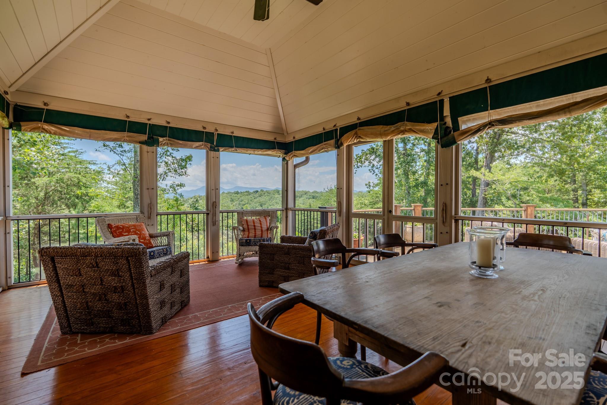 650 Golf Course Road Tryon, NC 28782 - Photo 23 of 48 a room with wooden floor and furniture