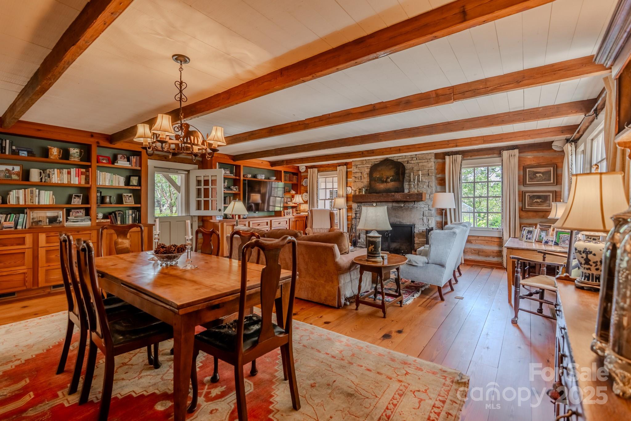 650 Golf Course Road Tryon, NC 28782 - Photo 25 of 48 a view of a dining room with furniture window and wooden floor