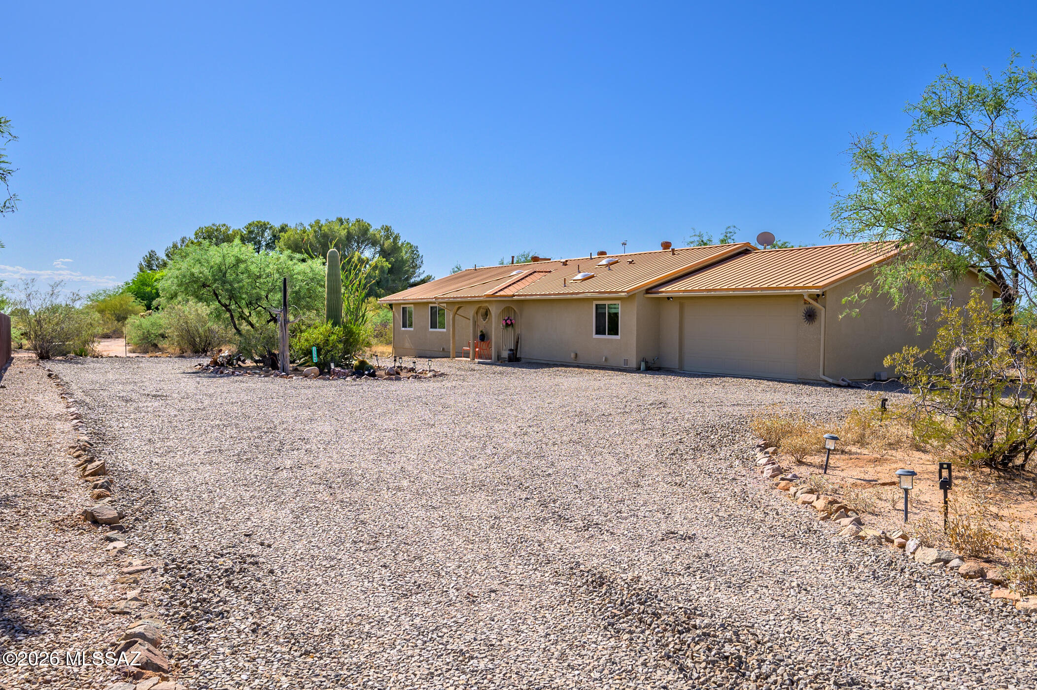 13599 East Rincon Ranch Road Vail, AZ 85641 - Photo 3 of 41 a view of outdoor space and front view of a house