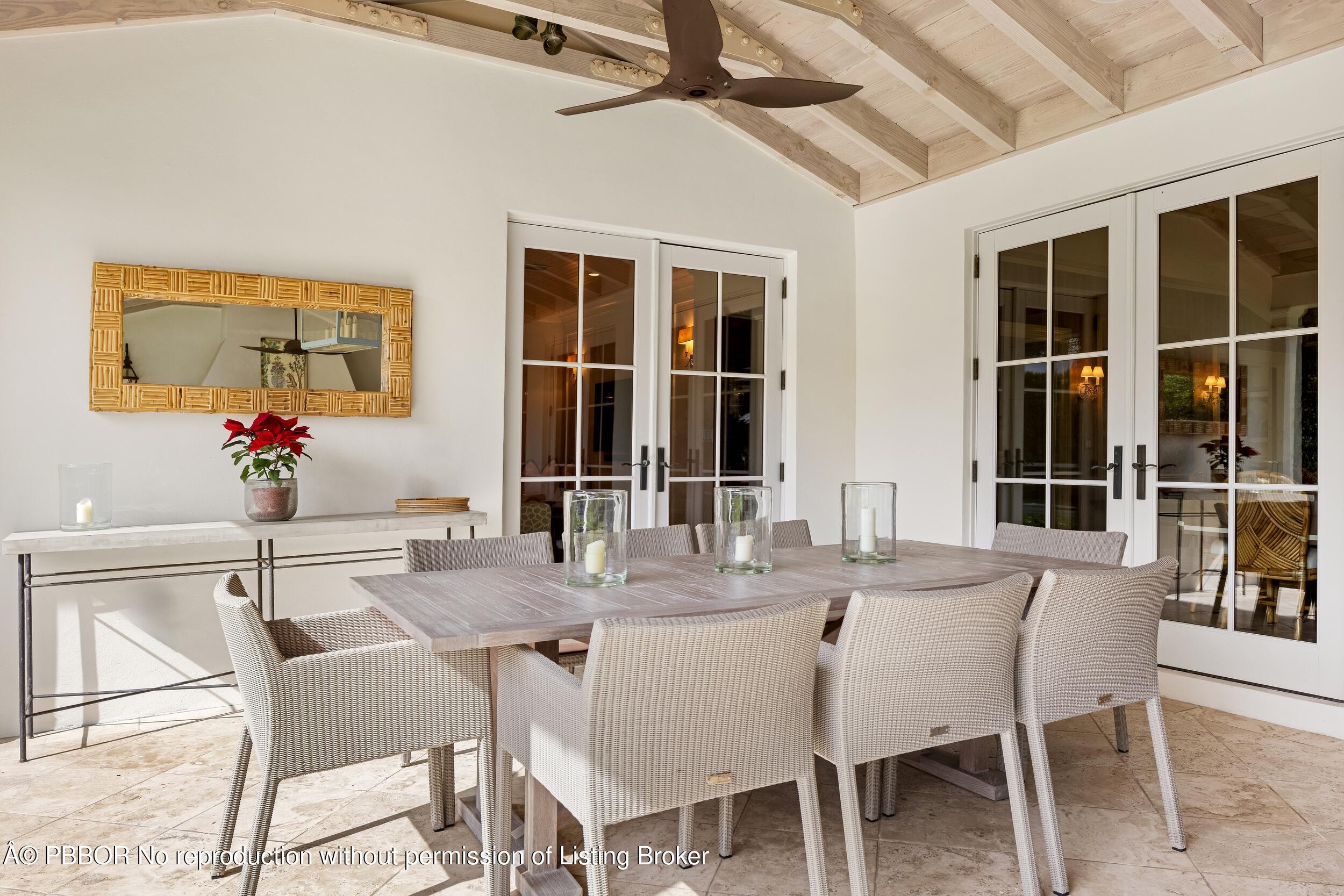 258 List Road Palm Beach, FL 33480 - Photo 36 of 45 a view of a dining room with furniture and window