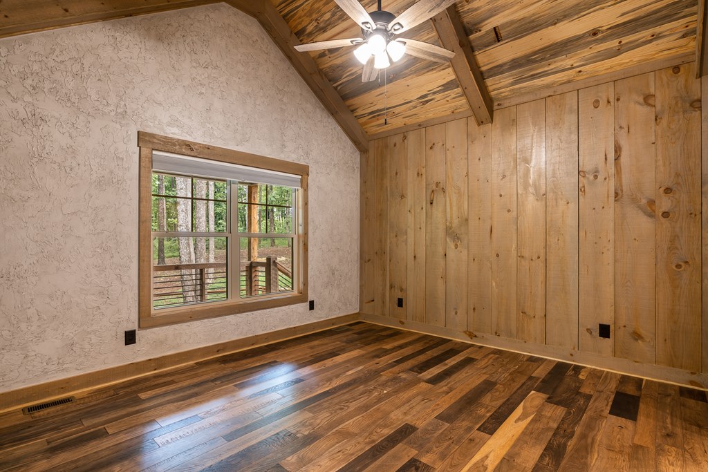 1450 Twisted Oak Road Talking Rock, GA 30175 - Photo 23 of 59 a view of a room with wooden floor and windows