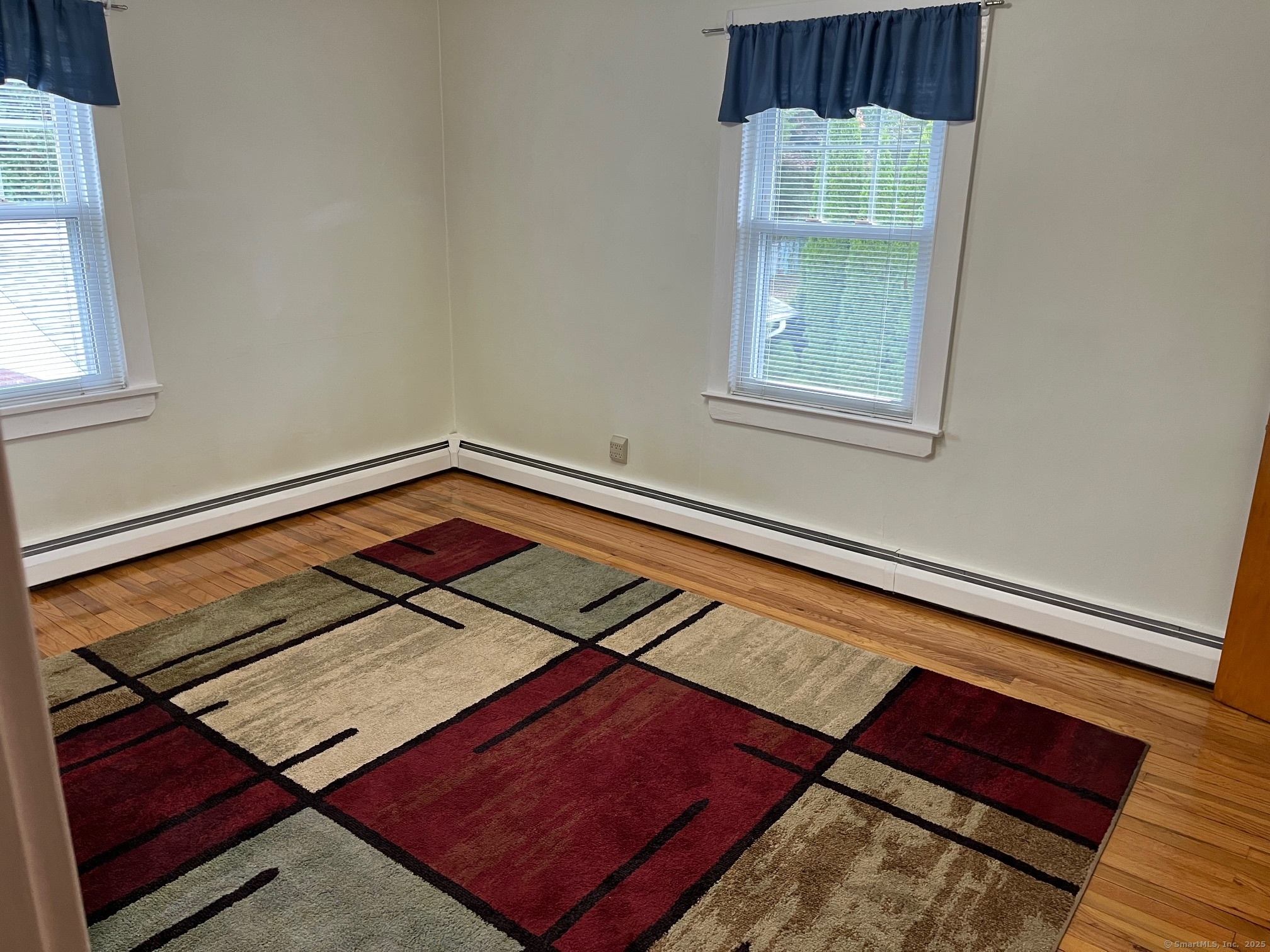 18 Coe Lane Ansonia, CT 06401 - Photo 11 of 12 a view of a living room with a rug