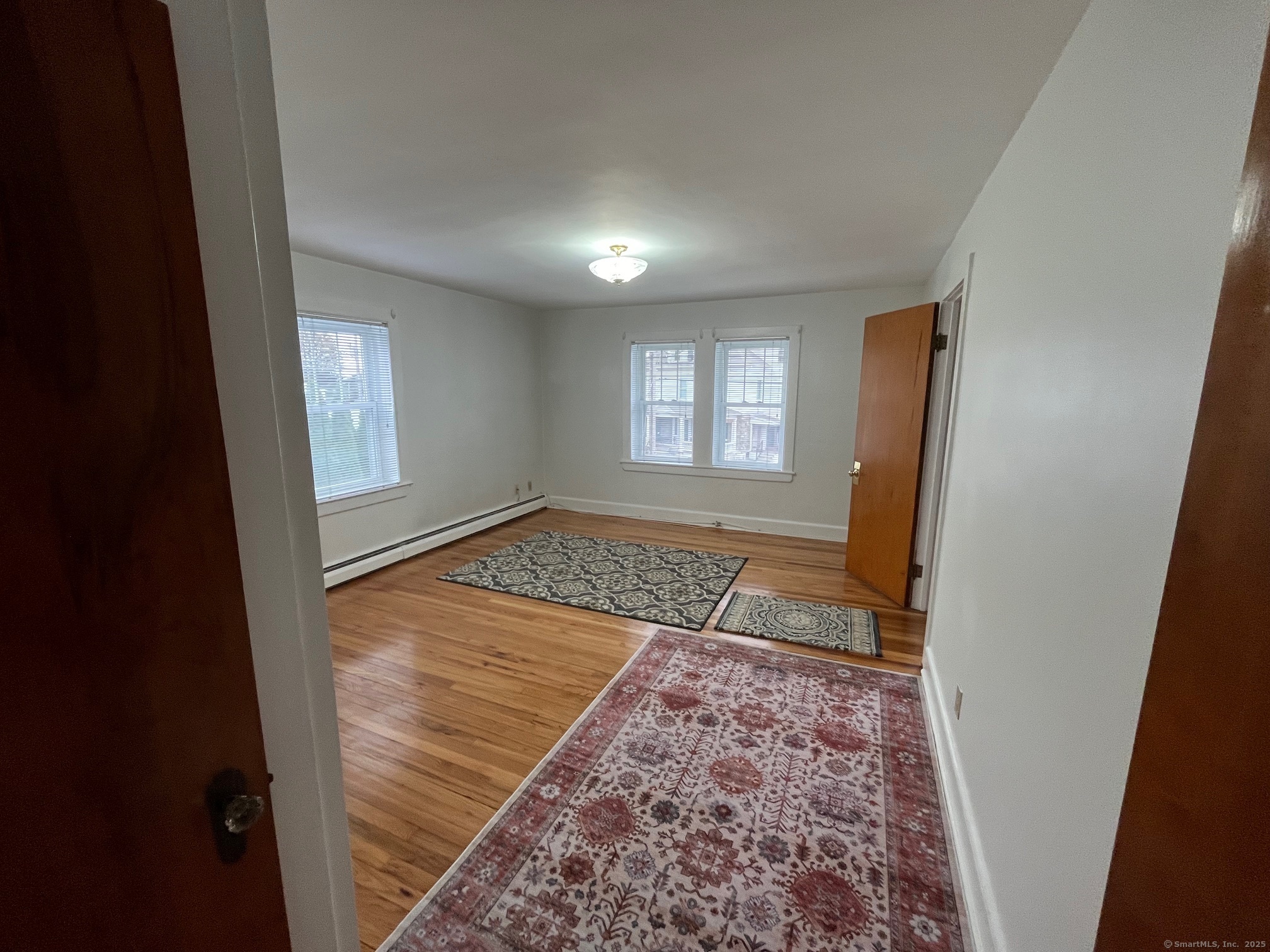 18 Coe Lane Ansonia, CT 06401 - Photo 9 of 12 a view of an empty room and window