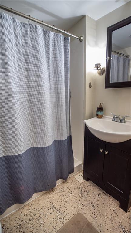 136 Clarks Pike Road Creighton, PA 15030 - Photo 23 of 27 a bathroom with a sink and a mirror