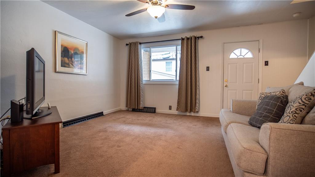 136 Clarks Pike Road Creighton, PA 15030 - Photo 5 of 27 a living room with furniture and a flat screen tv