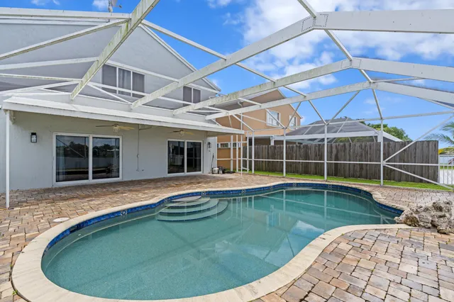 a view of a house with swimming pool