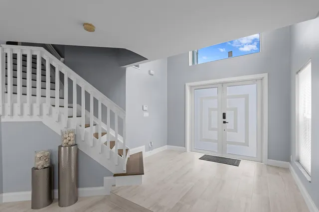 a view of an entryway with staircase