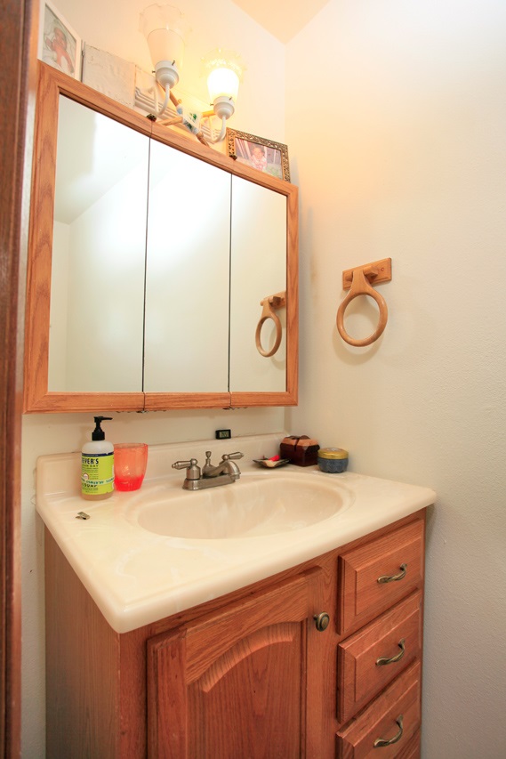 2811 Kokomo Road Haiku, HI 96708 - Photo 16 of 30 a bathroom with a sink and a mirror