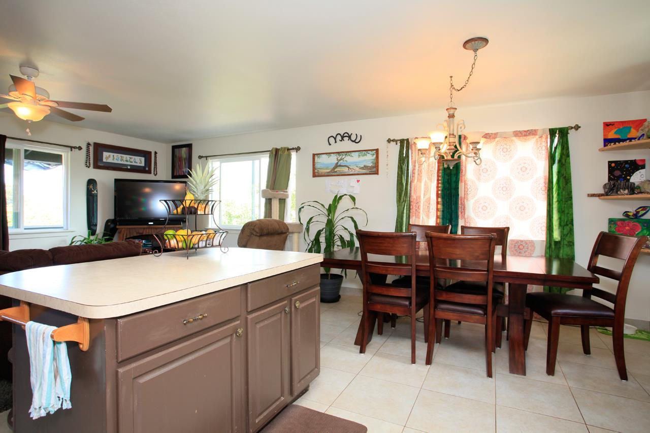 2811 Kokomo Road Haiku, HI 96708 - Photo 8 of 30 a view of a dining room with furniture