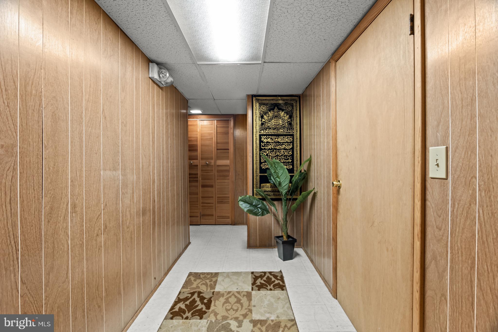 68 Liborio Lane New Castle, DE 19720 - Photo 23 of 38 a hallway with wooden floor and windows