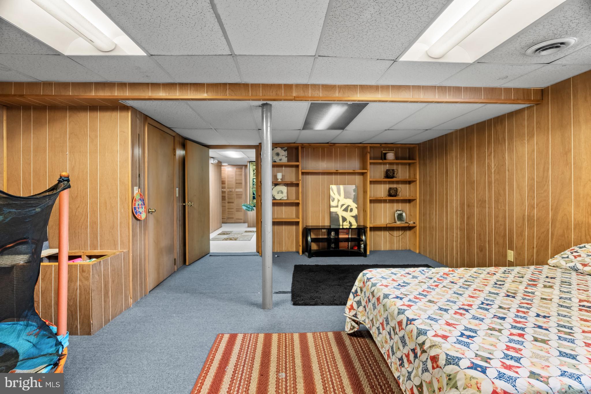 68 Liborio Lane New Castle, DE 19720 - Photo 26 of 38 a bedroom with a bed and wooden floor