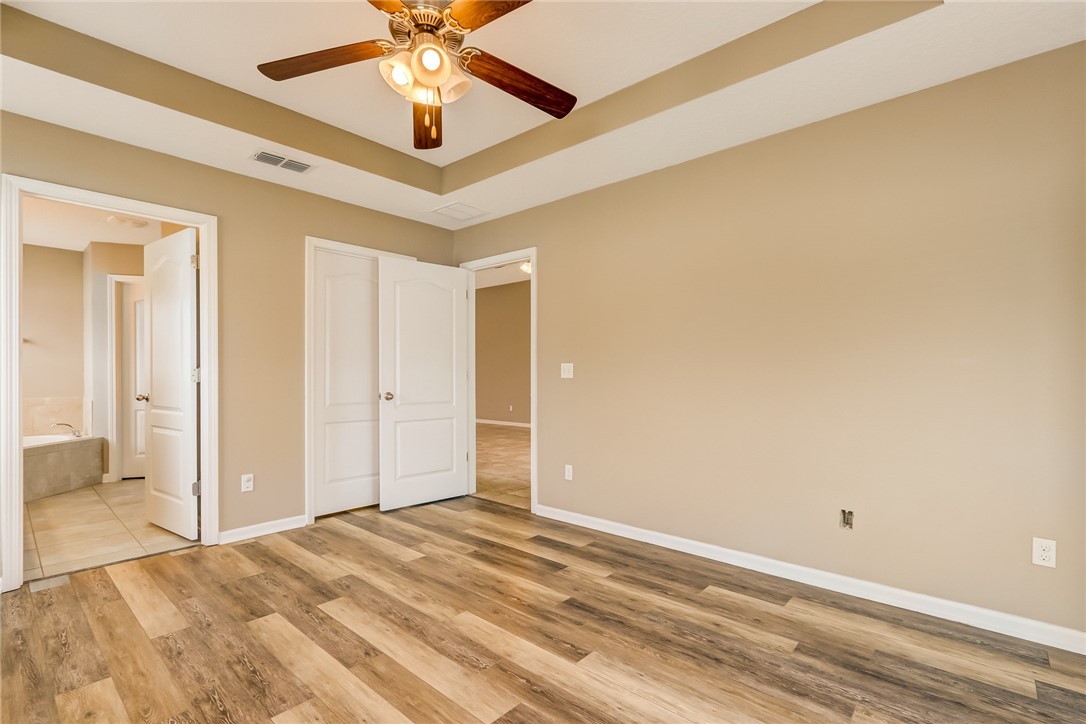 95227 Windflower Trail Fernandina Beach, FL 32034 - Photo 18 of 35 a view of a livingroom with a chandelier fan