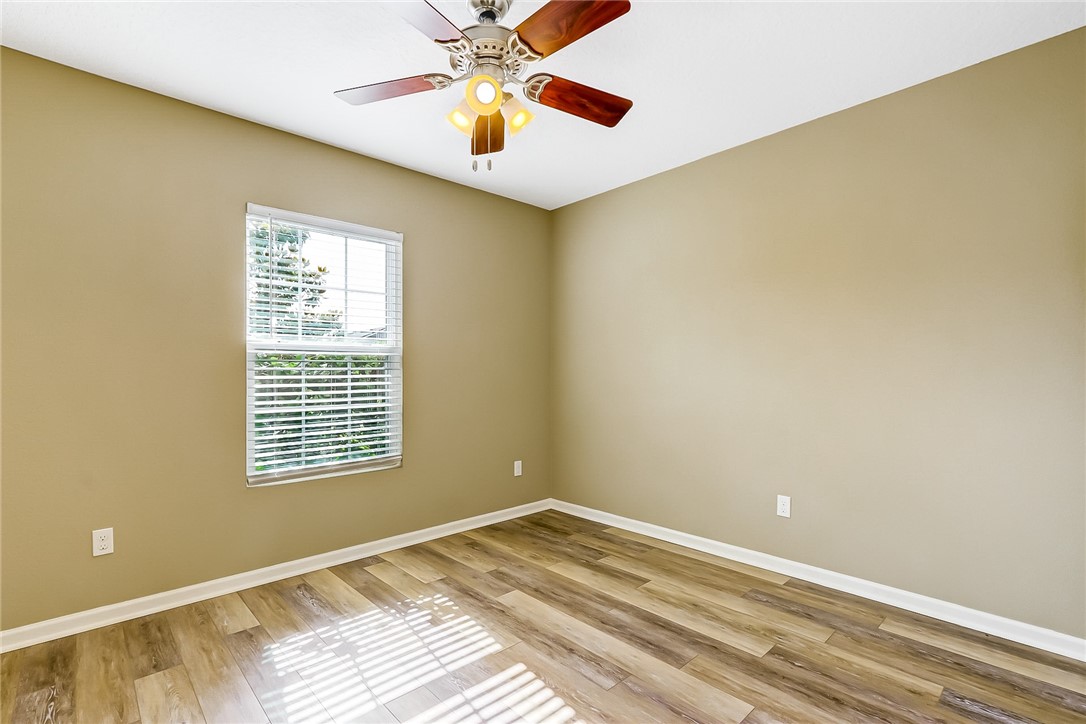 95227 Windflower Trail Fernandina Beach, FL 32034 - Photo 25 of 35 a view of a room with a ceiling fan and a window