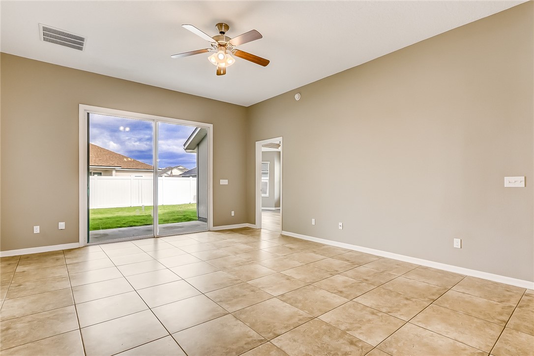95227 Windflower Trail Fernandina Beach, FL 32034 - Photo 7 of 35 a view of an empty room with a window