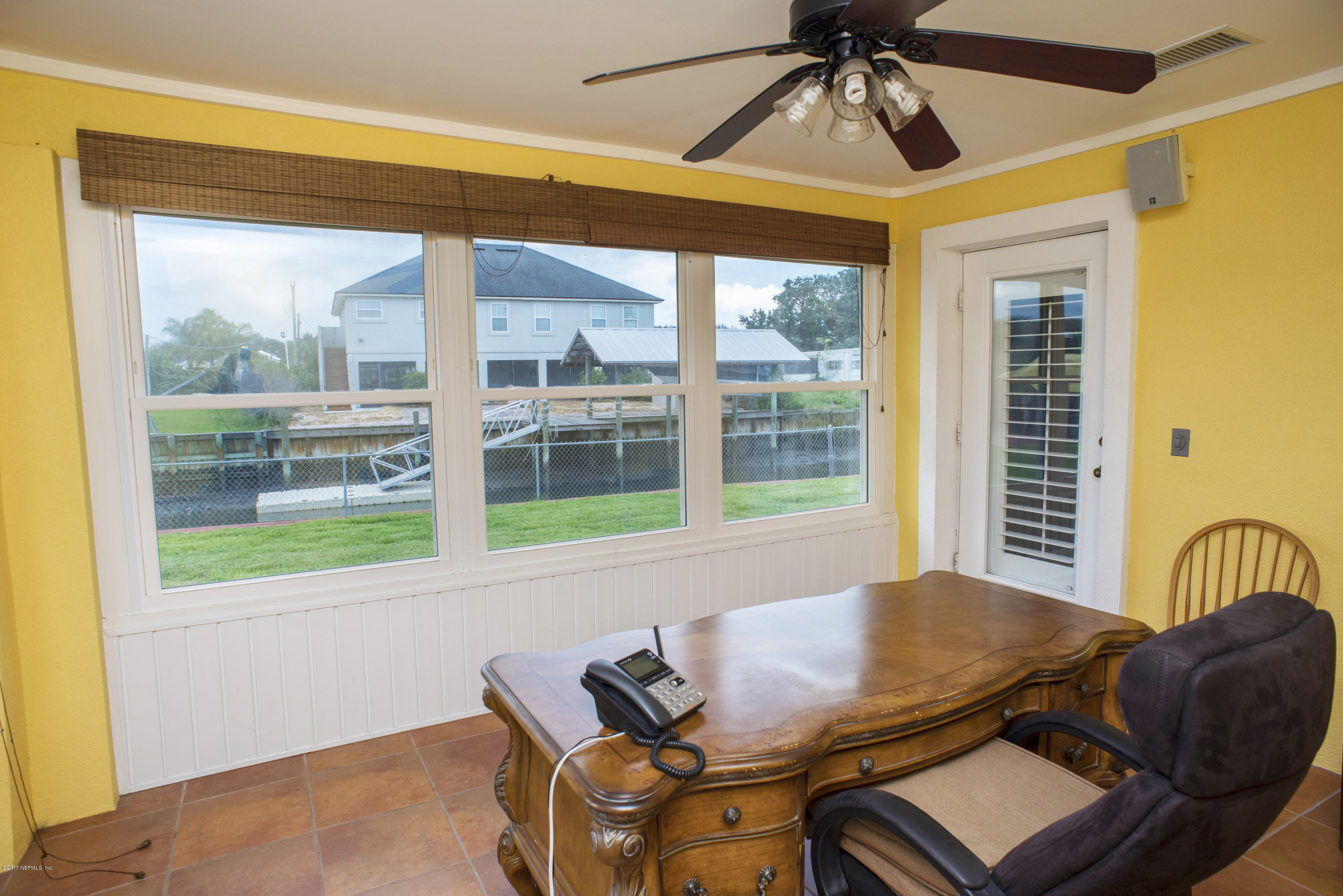 244 Barco Road St. Augustine, FL 32080 - Photo 19 of 31 a living room with furniture and a window