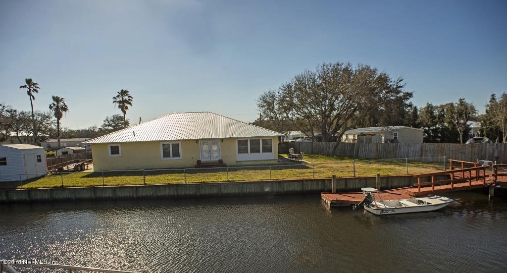 244 Barco Road St. Augustine, FL 32080 - Photo 2 of 31 a view of a swimming pool with lounge chair