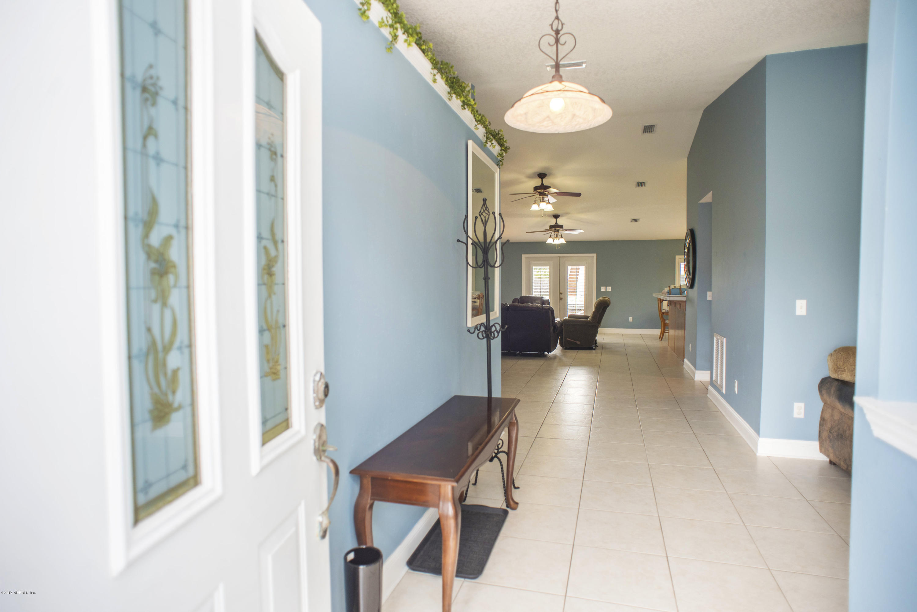 244 Barco Road St. Augustine, FL 32080 - Photo 3 of 31 a view of a living room and dining room