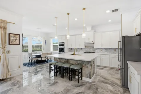 $980,000 | 984 Sterling Pine Place, Loxahatchee, FL 33470