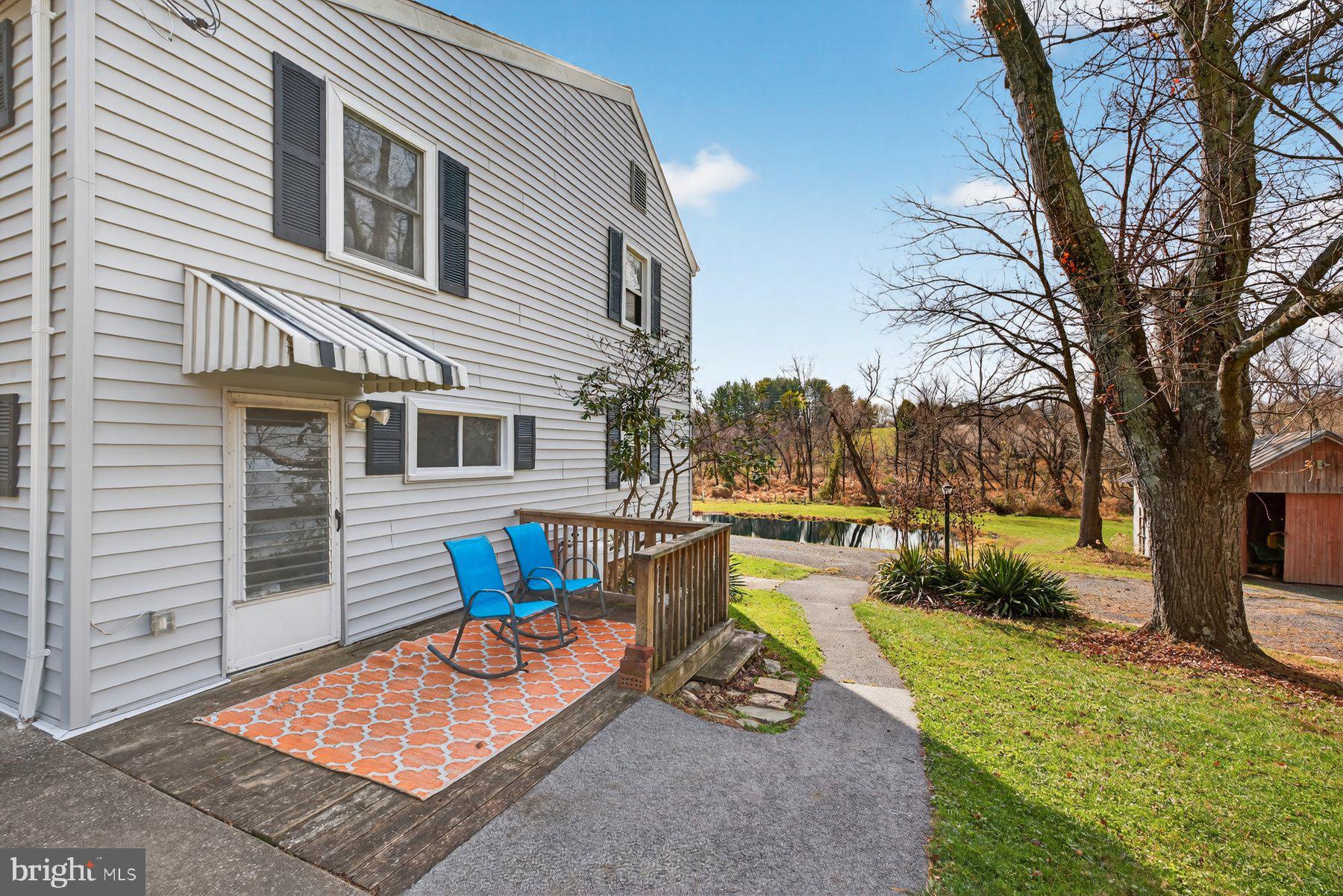 16306 Trenton Road Upperco, MD 21155 - Photo 14 of 55 a view of a house with backyard and sitting area