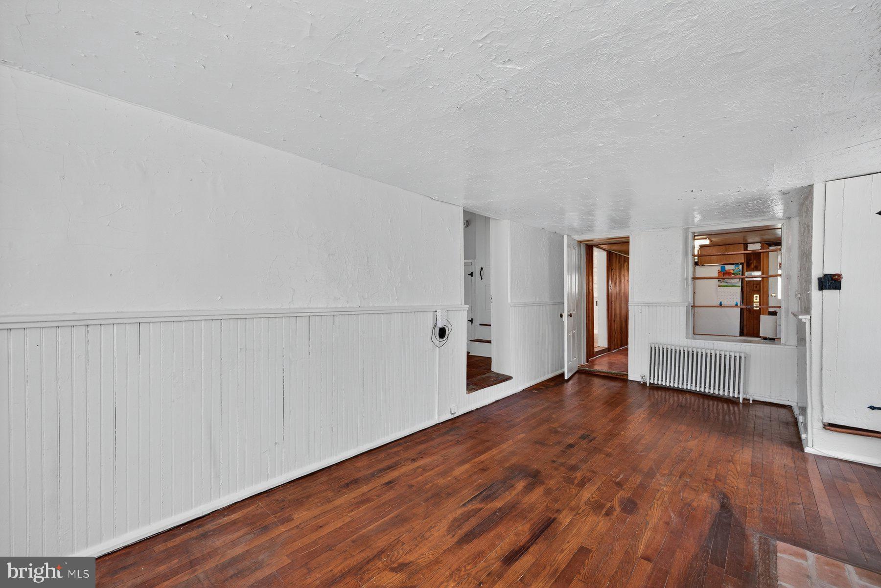 16306 Trenton Road Upperco, MD 21155 - Photo 19 of 55 a view of empty room with wooden floor