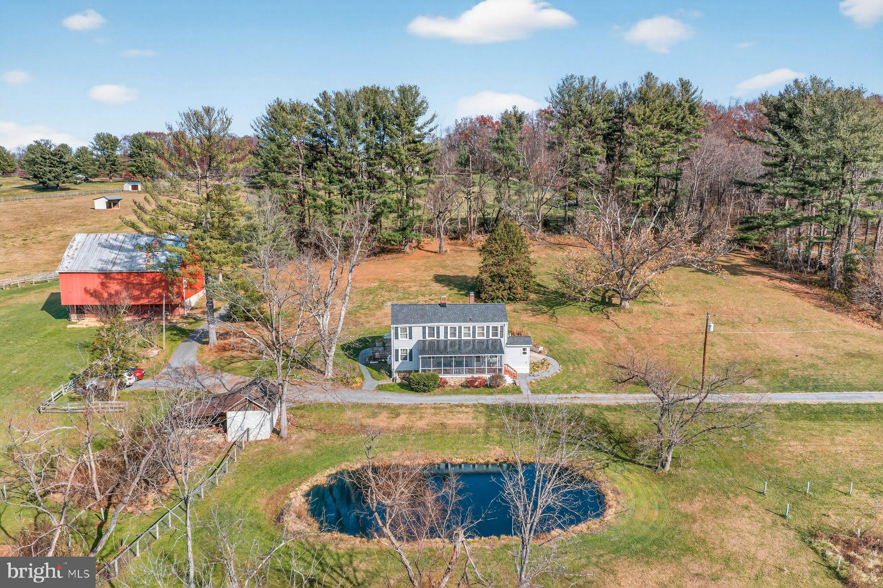 16306 Trenton Road Upperco, MD 21155 - Photo 2 of 55 a swimming pool with trees in the background