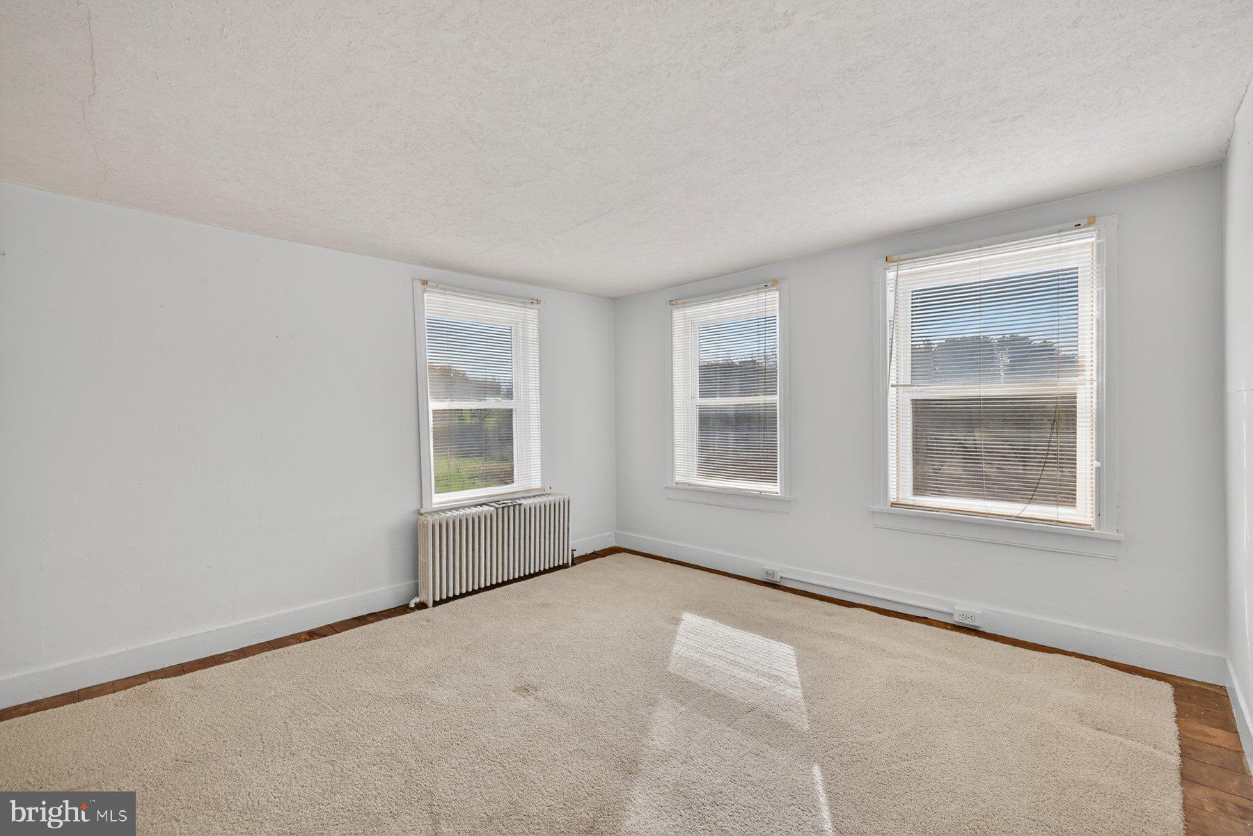 16306 Trenton Road Upperco, MD 21155 - Photo 23 of 55 an empty room with windows