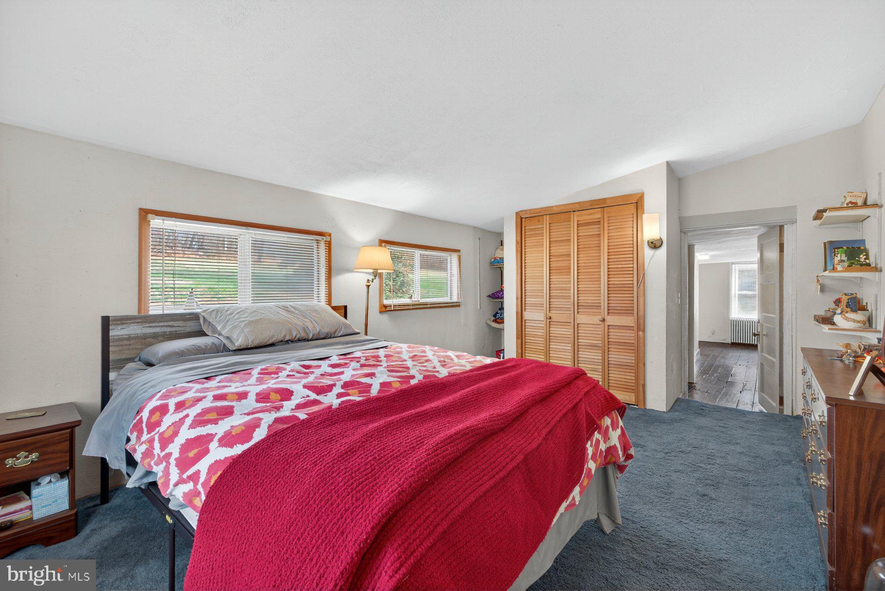 16306 Trenton Road Upperco, MD 21155 - Photo 33 of 55 a bedroom with a large bed and a window